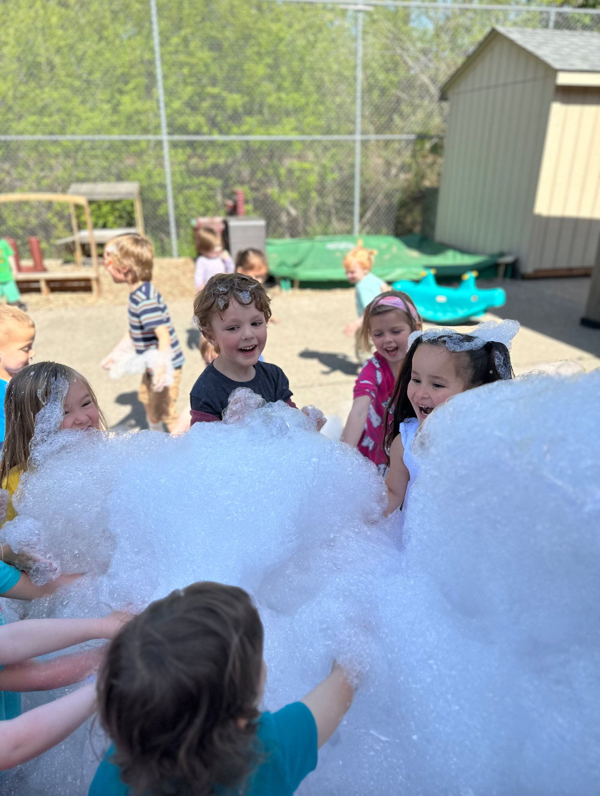 Children enjoying outdoor summer camp activities